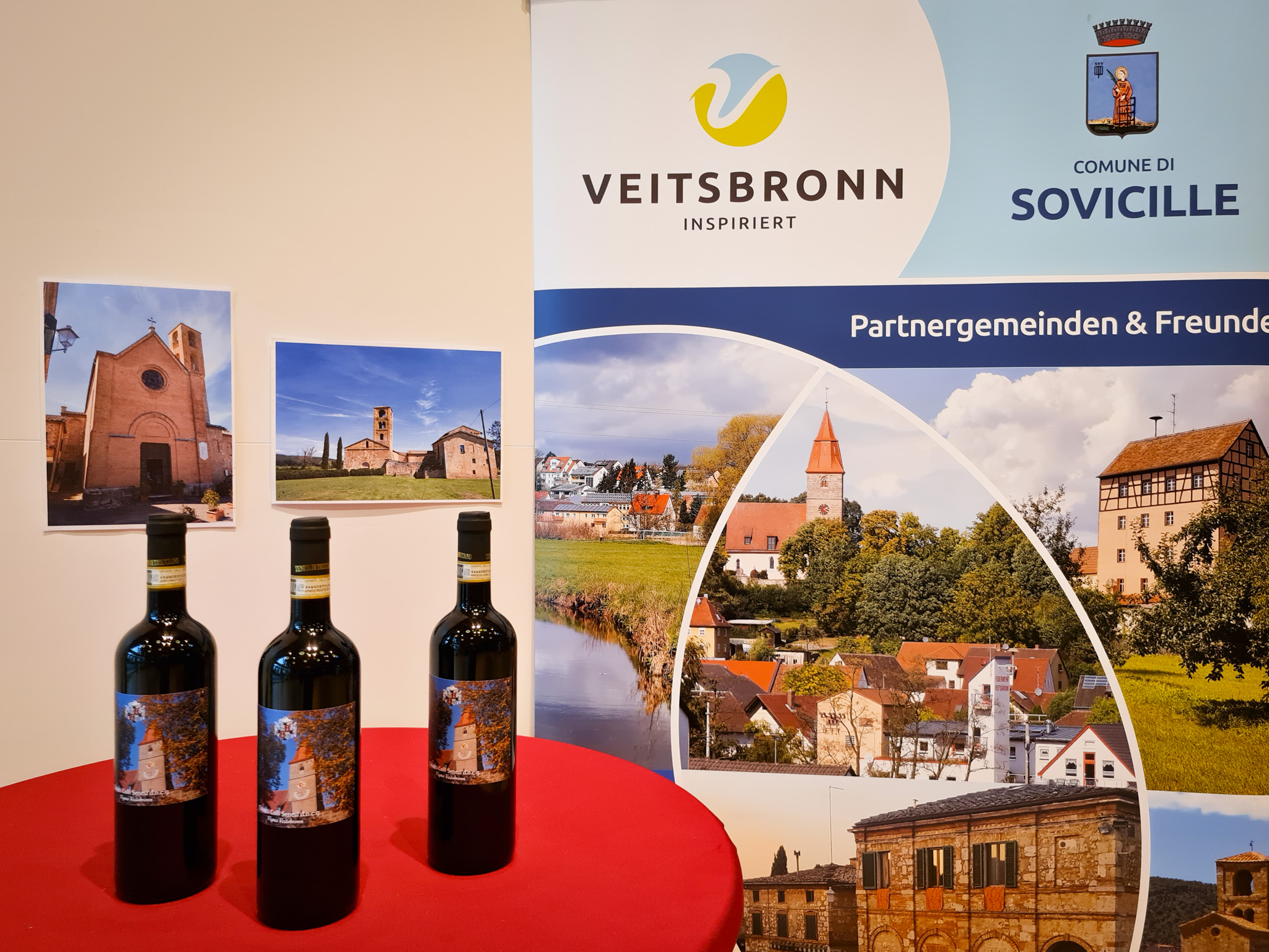 Veitsbronner Wein vor Partnergemeinden-Banner